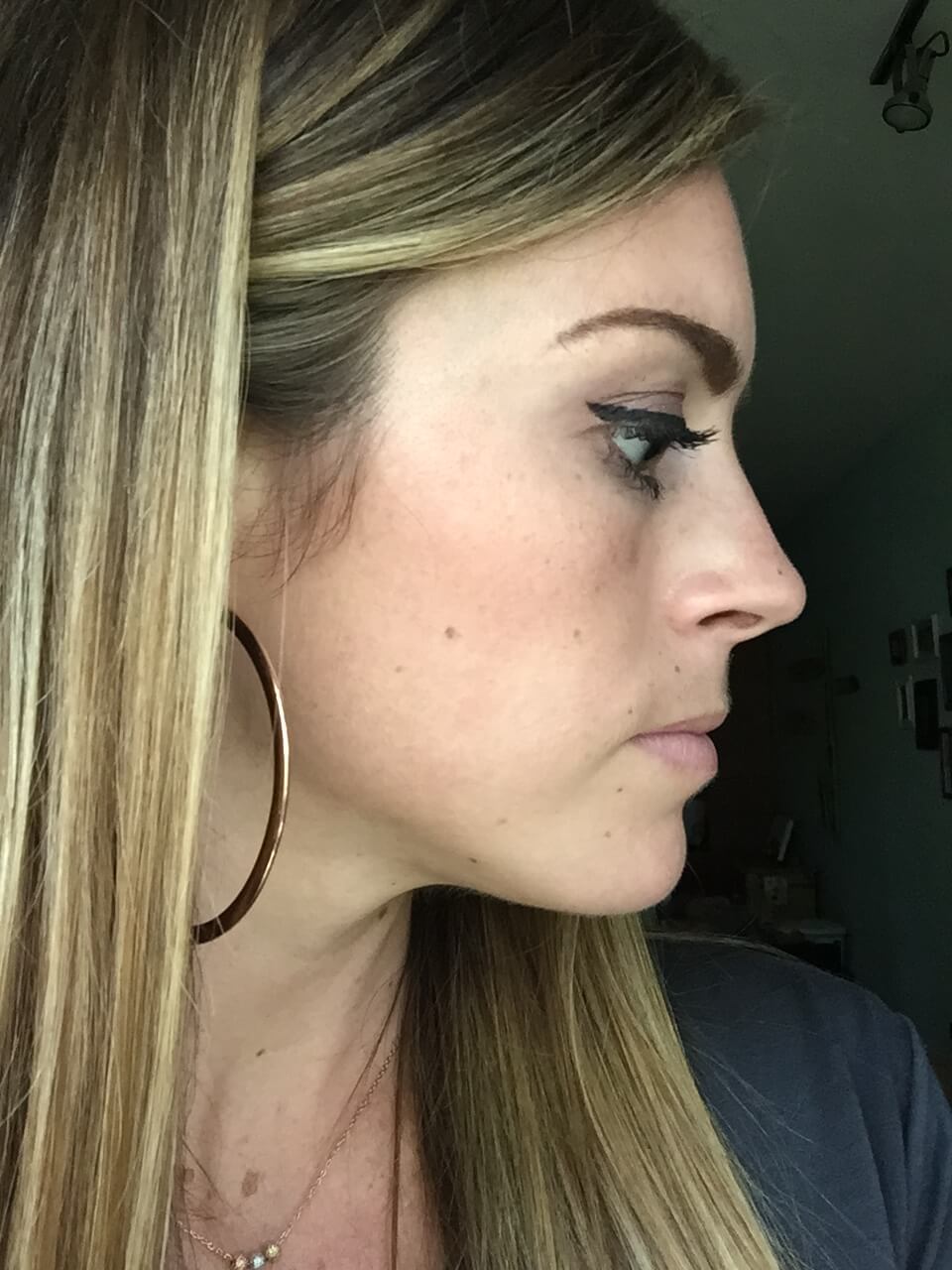 side view of girl showing cat eye makeup look